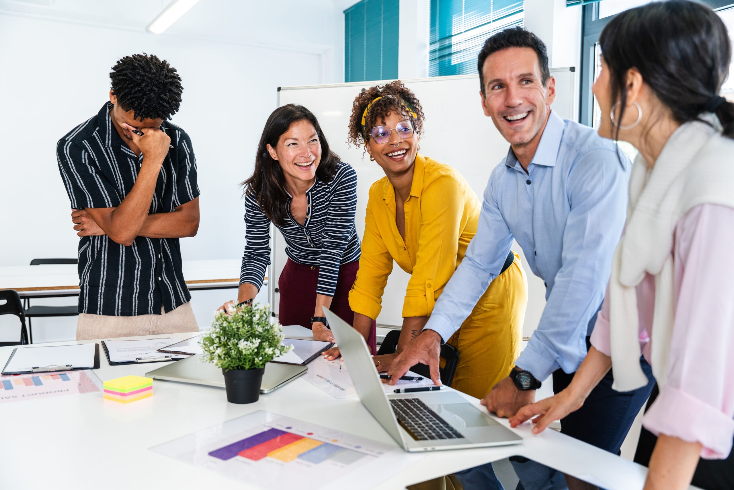Business team reviewing marketing strategy in a modern office